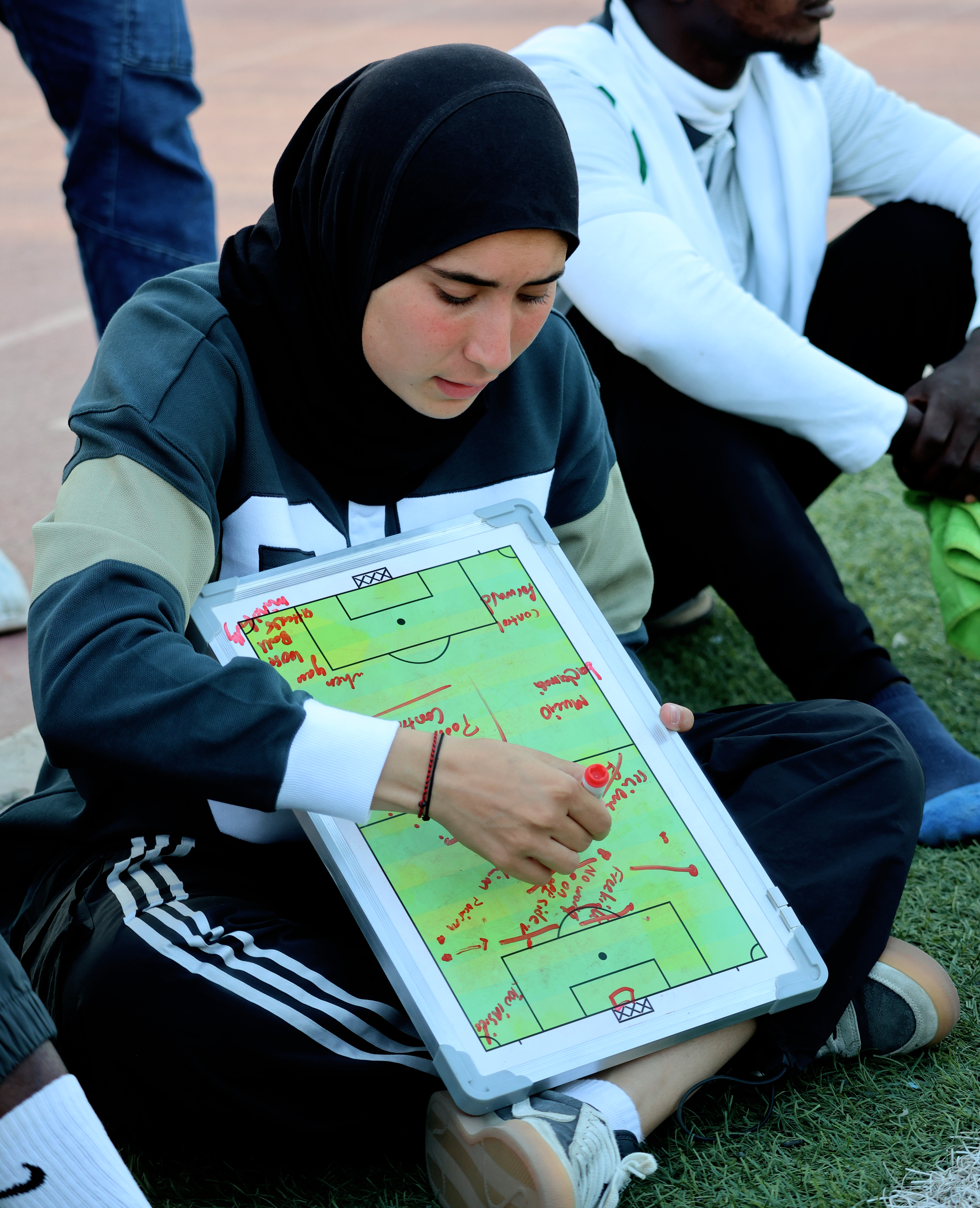 Hidaa Ghaddar coaching on the pitch